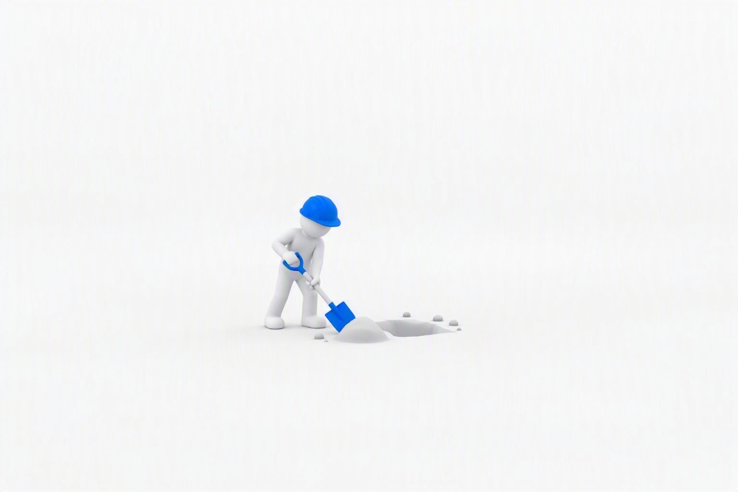 worker breaking ground, representing the start of Australia's industrial AI translation capability construction phase